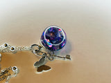 Pansy Amethyst Fairy Orb – 18mm Handcrafted Glass Pendant for Intuition and Calm by Moneca Melnick